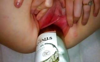 Nasty amateur slut moaning because of bottle in cunt