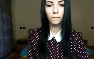 Naughty brunette with big tits poses in amateur solo porn